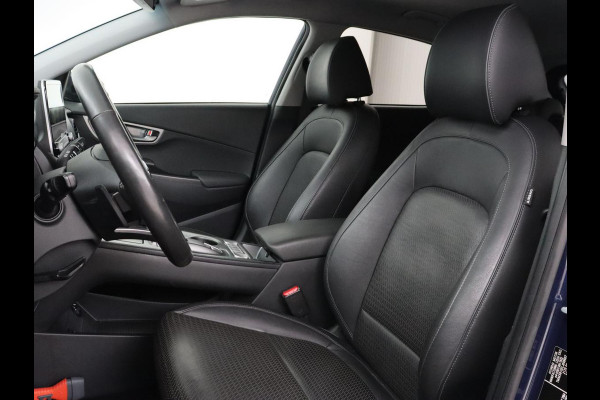 Hyundai Kona EV Premium 64 kWh | Leder | Stoelventilatie | Adaptive cruise | Wamtepomp | Head-Up | Camera | Carplay | Achterbankverwarming | Navigatie | Keyless