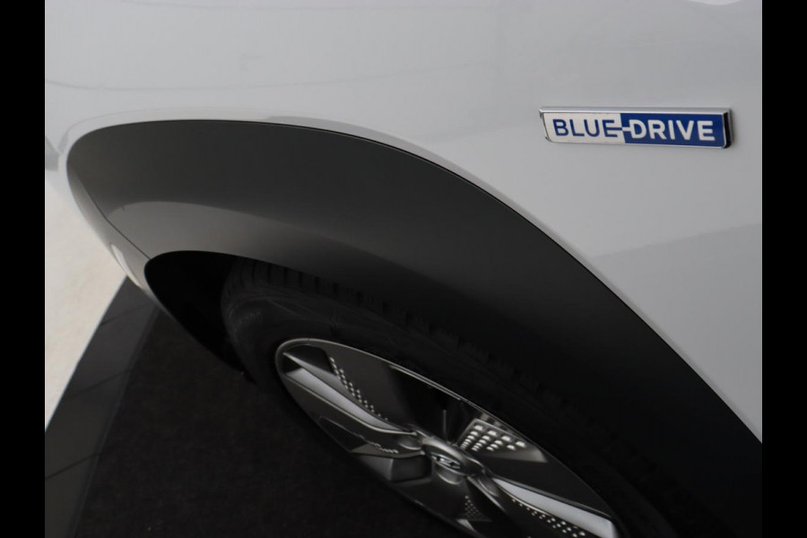 Hyundai Kona EV Comfort 64 kWh | Trekhaak | Adaptive cruise | Warmtepomp | Camera | Carplay | Keyless | Navigatie | Climate control