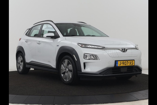 Hyundai Kona EV Comfort 64 kWh | Trekhaak | Adaptive cruise | Warmtepomp | Camera | Carplay | Keyless | Navigatie | Climate control