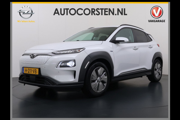 Hyundai Kona EV 64kWh 204pk SOH 100% Premium Leer Warmtepomp Head-Up Display Apple Carplay Android Navi Camera Elektr.Stoelen+Leer+Verwarmd+G Pdc Subwoofer Bluetooth Dodehoek detector Privacy Glas Rijstrooksensor 1e Eigenaar Origineel Nederlandse Auto  € 48.210 nieuw!