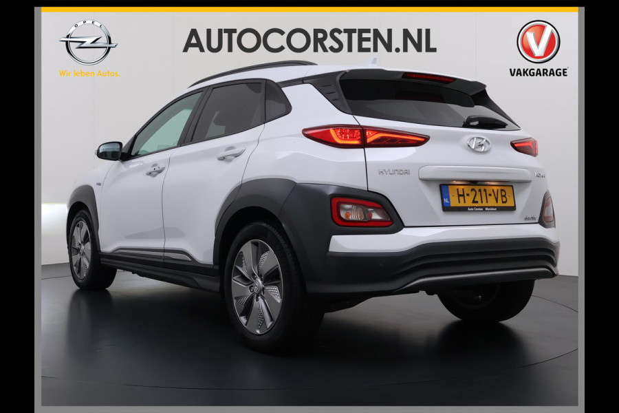 Hyundai Kona EV 64kWh 204pk SOH 100% Premium Leer Warmtepomp Head-Up Display Apple Carplay Android Navi Camera Elektr.Stoelen+Leer+Verwarmd+G Pdc Subwoofer Bluetooth Dodehoek detector Privacy Glas Rijstrooksensor 1e Eigenaar Origineel Nederlandse Auto  € 48.210 nieuw!