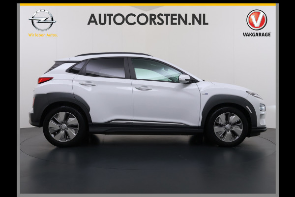 Hyundai Kona EV 64kWh 204pk SOH 100% Premium Leer Warmtepomp Head-Up Display Apple Carplay Android Navi Camera Elektr.Stoelen+Leer+Verwarmd+G Pdc Subwoofer Bluetooth Dodehoek detector Privacy Glas Rijstrooksensor 1e Eigenaar Origineel Nederlandse Auto  € 48.210 nieuw!