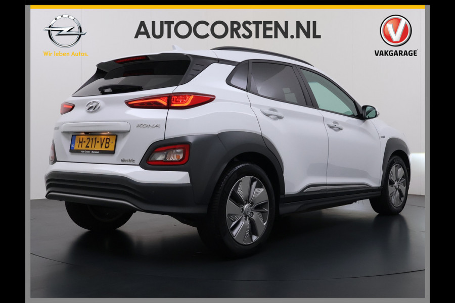 Hyundai Kona EV 64kWh 204pk SOH 100% Premium Leer Warmtepomp Head-Up Display Apple Carplay Android Navi Camera Elektr.Stoelen+Leer+Verwarmd+G Pdc Subwoofer Bluetooth Dodehoek detector Privacy Glas Rijstrooksensor 1e Eigenaar Origineel Nederlandse Auto  € 48.210 nieuw!