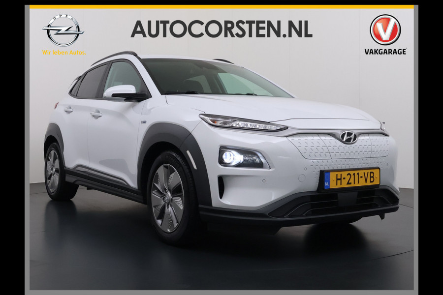Hyundai Kona EV 64kWh 204pk SOH 100% Premium Leer Warmtepomp Head-Up Display Apple Carplay Android Navi Camera Elektr.Stoelen+Leer+Verwarmd+G Pdc Subwoofer Bluetooth Dodehoek detector Privacy Glas Rijstrooksensor 1e Eigenaar Origineel Nederlandse Auto  € 48.210 nieuw!