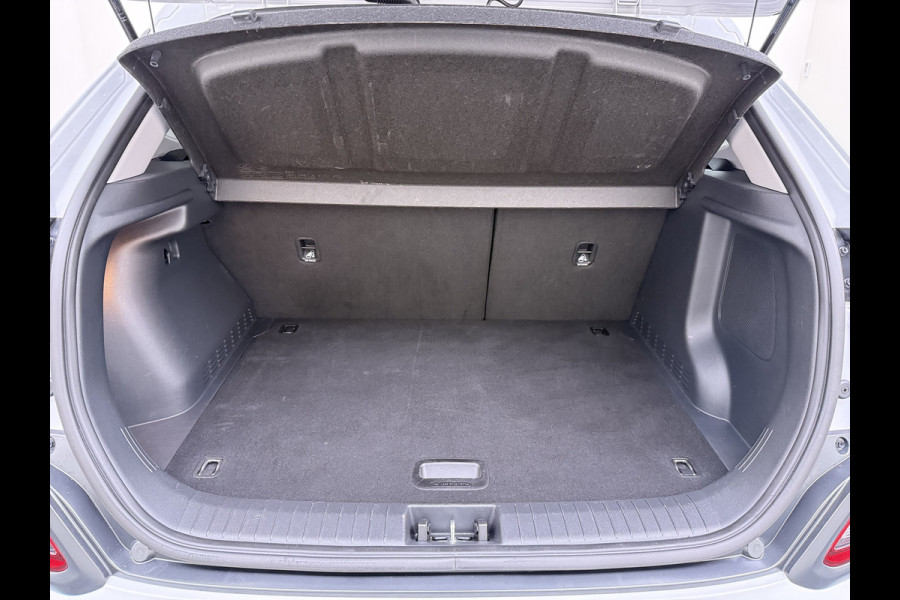 Hyundai Kona EV 64kWh 204pk SOH 100% Premium Leer Warmtepomp Head-Up Display Apple Carplay Android Navi Camera Elektr.Stoelen+Leer+Verwarmd+G Pdc Subwoofer Bluetooth Dodehoek detector Privacy Glas Rijstrooksensor 1e Eigenaar Origineel Nederlandse Auto  € 48.210 nieuw!