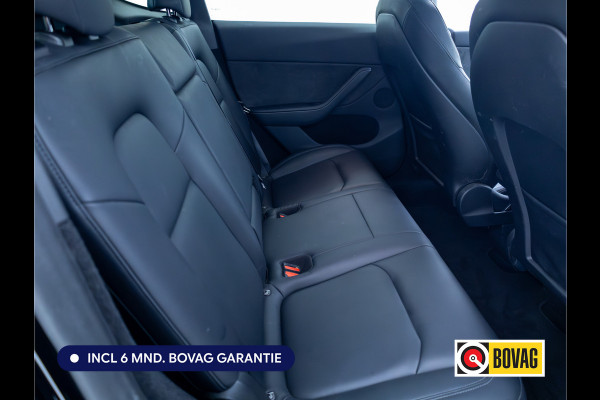 Tesla Model Y RWD 58 kWh | Panoramadak | Stoel-stuurverwarming | Zwart leder | Navigatie | Extra getint glas Camera, Autopilot, Dodehoek detector, Elektrisch verstelbare stoelen