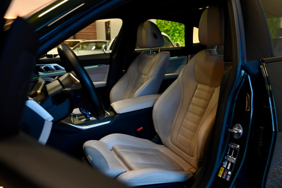 BMW i4 EDrive40 High Executive 84 kWh - M-Sport - Stuurverwarming - Harman Kardon - Adaptive Cruise Control - Schuifdak -