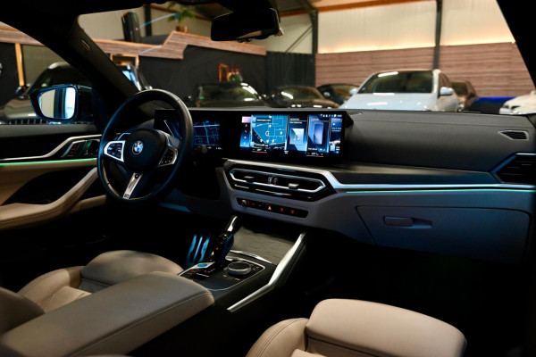BMW i4 EDrive40 High Executive 84 kWh - M-Sport - Stuurverwarming - Harman Kardon - Adaptive Cruise Control - Schuifdak -