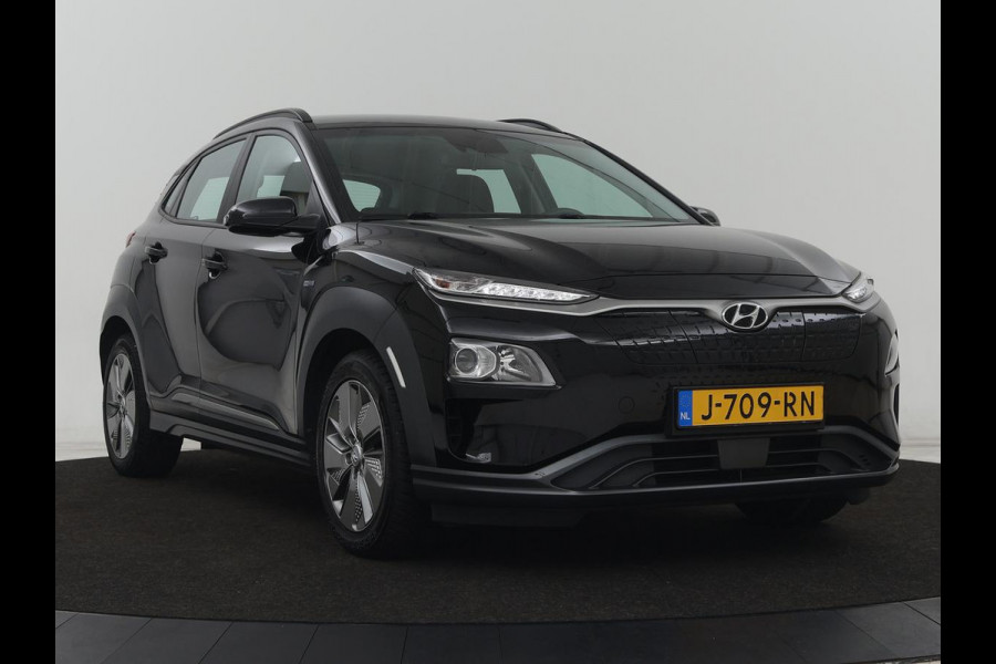 Hyundai Kona EV Comfort 64 kWh | Adaptive cruise | Krell Audio | Warmtepomp | Keyless | Parkeerhulp | Digital Cockpit | Navigatie | Climate control