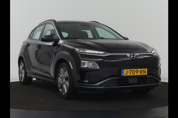 Hyundai Kona EV Comfort 64 kWh | Adaptive cruise | Krell Audio | Warmtepomp | Keyless | Parkeerhulp | Digital Cockpit | Navigatie | Climate control