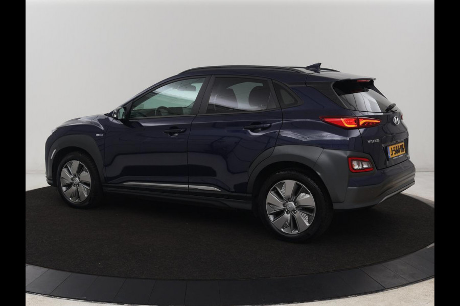 Hyundai Kona EV Fashion 64 kWh | 3-Fase | SOH 100% | Head-Up | Adaptive cruise | Carplay | Warmtepomp | Camera | Krell Audio | Navigatie | Parkeerhulp
