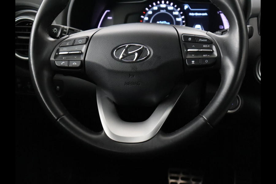 Hyundai Kona EV Fashion 64 kWh | 3-Fase | SOH 100% | Head-Up | Adaptive cruise | Carplay | Warmtepomp | Camera | Krell Audio | Navigatie | Parkeerhulp