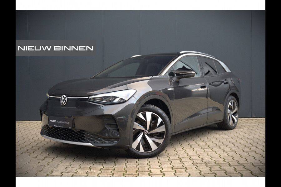 Volkswagen ID.4 First 77 kWh | Stoelverwarming | Stuurverwarming | Trekhaak | Warmtepomp | Adaptive Cruise Control | Navigatie | Apple Carplay | Keyless | Camera | Parkersensoren |