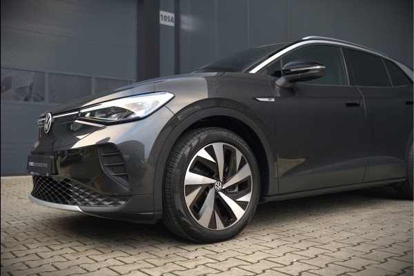 Volkswagen ID.4 First 77 kWh | Stoelverwarming | Stuurverwarming | Trekhaak | Warmtepomp | Adaptive Cruise Control | Navigatie | Apple Carplay | Keyless | Camera | Parkersensoren |