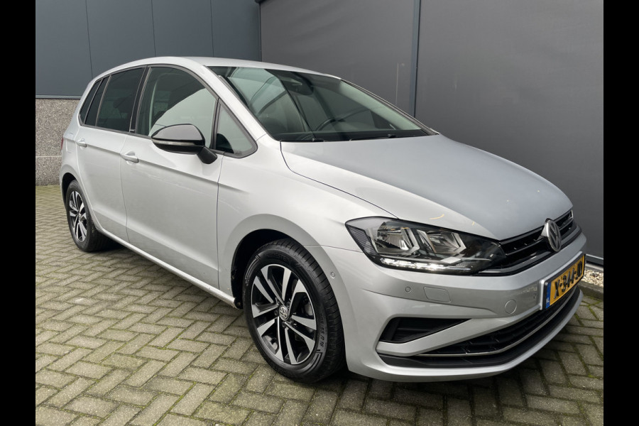 Volkswagen Golf Sportsvan 1.5 TSI ACT Comfortline Airco - Cruise control - Navigatiesysteem - Parkeersensoren voor en achter - Trekhaak - Voorstoelen verwarmd - Licht metalen velgen 16 inch - Radio - Start/stop systeem - Stuur leder - Stuur