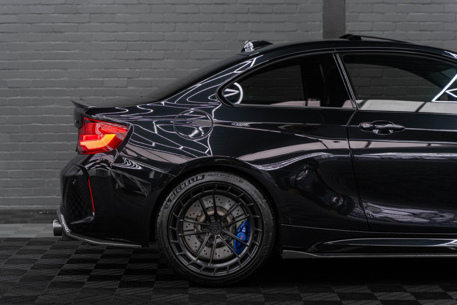 BMW 2 Serie Coupé M2 DCT | NOVA PERFORMANCE 19 INCH CUSTOM WHEELS | CS STOELEN | CS STUUR | CARBON INTERIEUR EN EXTERIEUR| voorzien van Target Blu Eye 2 en Laser Track Flare