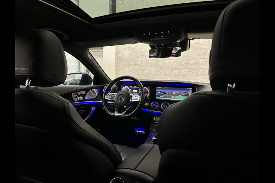 Mercedes-Benz CLS-Klasse 450 4MATIC Edition 1 AMG-Line | 360 Camera | Leder-Exclusief | ACC | Burmester | Schuifdak | Multibeam-LED | Sfeerverlichting | Memory | Stoelverwarming V+A | IWC-Klokje | ISO-Glas | 20'' | Dodehoek | Lane Assist | Carplay |