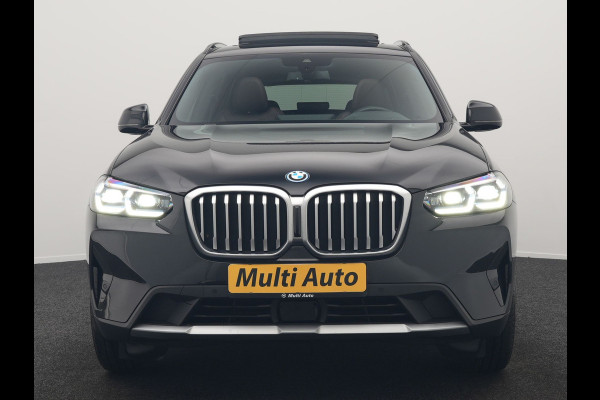 BMW X3 xDrive30e Business Edition Plus Plug In Hybrid 293pk FACELIFT Dealer O.H. PHEV | Trekhaak Af Fabriek | Panodak | Adaptive Cruise | Head Up | Laser LED | Camera | Lederen Sportstoelen & Stuur Verwarmd | Sfeerverlichting | Apple Carplay | Virtual | Keyless | DAB |