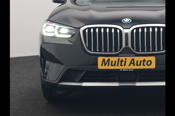BMW X3 xDrive30e Business Edition Plus Plug In Hybrid 293pk FACELIFT Dealer O.H. PHEV | Trekhaak Af Fabriek | Panodak | Adaptive Cruise | Head Up | Laser LED | Camera | Lederen Sportstoelen & Stuur Verwarmd | Sfeerverlichting | Apple Carplay | Virtual | Keyless | DAB |