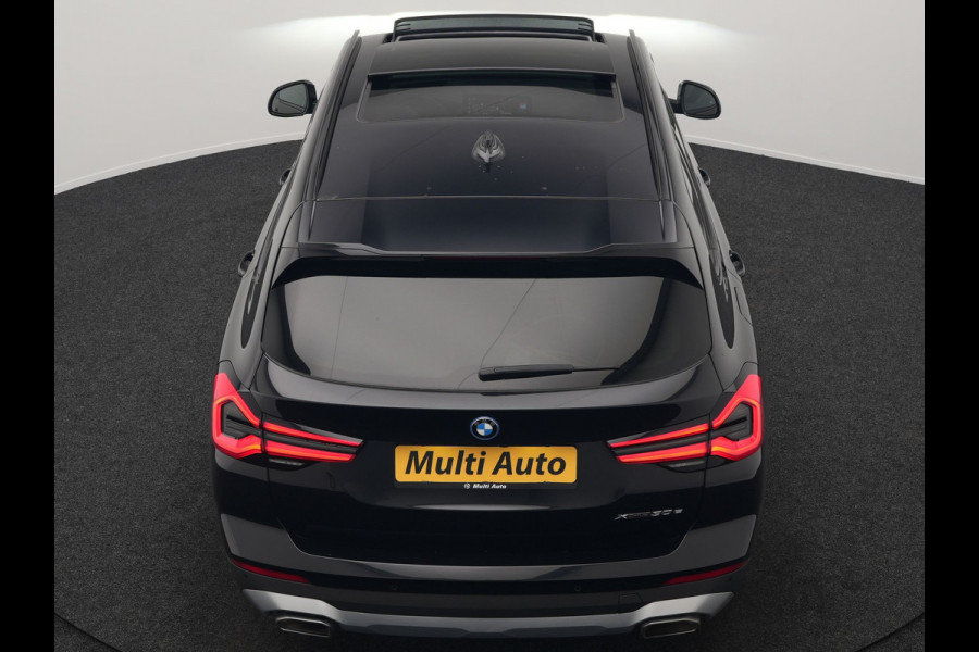 BMW X3 xDrive30e Business Edition Plus Plug In Hybrid 293pk FACELIFT Dealer O.H. PHEV | Trekhaak Af Fabriek | Panodak | Adaptive Cruise | Head Up | Laser LED | Camera | Lederen Sportstoelen & Stuur Verwarmd | Sfeerverlichting | Apple Carplay | Virtual | Keyless | DAB |
