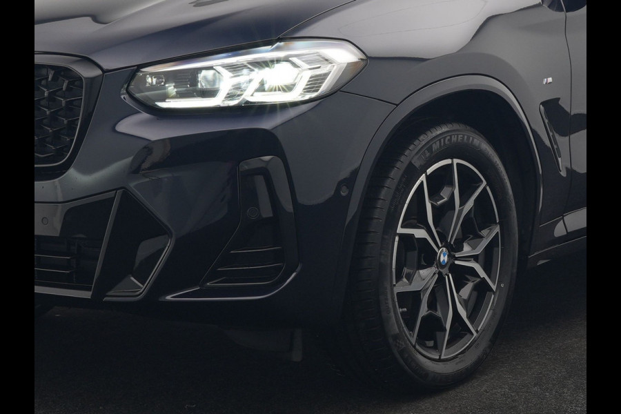 BMW X4 xDrive20i M Sport 184pk Dealer O.H. Carbon Schwarz Metallic | Adaptive Cruise | Camera | Sfeerverlichting | Lederen Sportstoelen Verwarmd | Apple Carplay | Virtual Cockpit | Navigatie | DAB | 19"L.M |