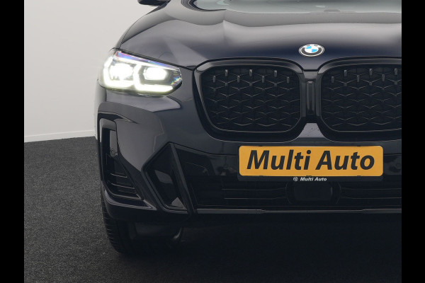 BMW X4 xDrive20i M Sport 184pk Dealer O.H. Carbon Schwarz Metallic | Adaptive Cruise | Camera | Sfeerverlichting | Lederen Sportstoelen Verwarmd | Apple Carplay | Virtual Cockpit | Navigatie | DAB | 19"L.M |