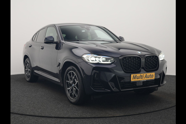 BMW X4 xDrive20i M Sport 184pk Dealer O.H. Carbon Schwarz Metallic | Adaptive Cruise | Camera | Sfeerverlichting | Lederen Sportstoelen Verwarmd | Apple Carplay | Virtual Cockpit | Navigatie | DAB | 19"L.M |