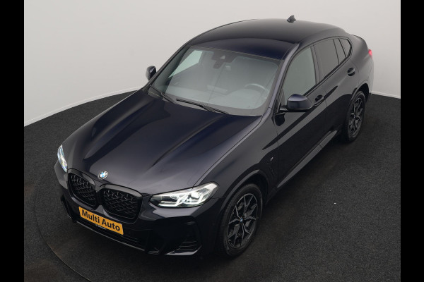 BMW X4 xDrive20i M Sport 184pk Dealer O.H. Carbon Schwarz Metallic | Adaptive Cruise | Camera | Sfeerverlichting | Lederen Sportstoelen Verwarmd | Apple Carplay | Virtual Cockpit | Navigatie | DAB | 19"L.M |