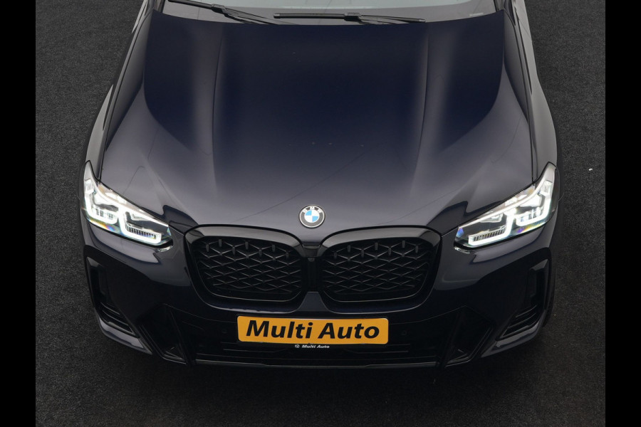 BMW X4 xDrive20i M Sport 184pk Dealer O.H. Carbon Schwarz Metallic | Adaptive Cruise | Camera | Sfeerverlichting | Lederen Sportstoelen Verwarmd | Apple Carplay | Virtual Cockpit | Navigatie | DAB | 19"L.M |