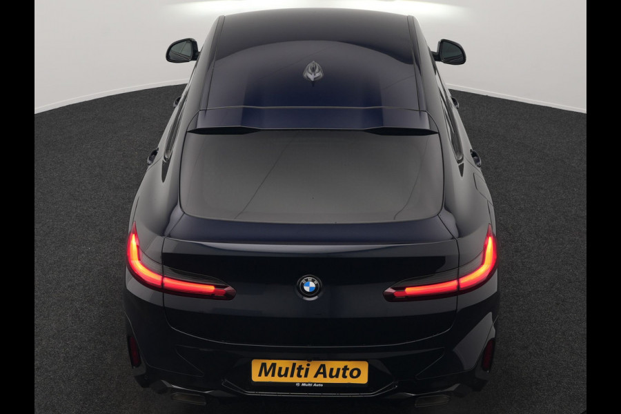 BMW X4 xDrive20i M Sport 184pk Dealer O.H. Carbon Schwarz Metallic | Adaptive Cruise | Camera | Sfeerverlichting | Lederen Sportstoelen Verwarmd | Apple Carplay | Virtual Cockpit | Navigatie | DAB | 19"L.M |