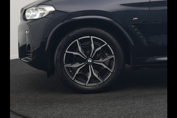 BMW X4 xDrive20i M Sport 184pk Dealer O.H. Carbon Schwarz Metallic | Adaptive Cruise | Camera | Sfeerverlichting | Lederen Sportstoelen Verwarmd | Apple Carplay | Virtual Cockpit | Navigatie | DAB | 19"L.M |