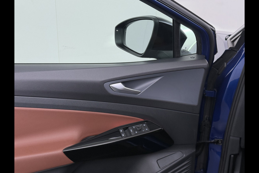 Volkswagen ID.4 First 82kWh SOH 93% Warmtepomp Trekhaak Adap.Cruise Navi Ecc Camera Apple Carplay Android Auto Pdc Lmv  20" Privacy Glas Led Rijstrooksensor Stuur+Stoelverwarming Origineel Nederlandse Auto