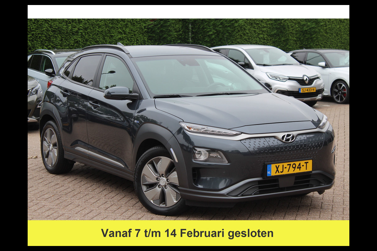 Hyundai Kona EV Premium 64 kWh / Camera / Leder / Head-up / 18'' / Navigatie / Stuur+Stoelverwarming / Keyless / KRELL Audio / DAB / ACC