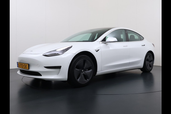 Tesla Model 3 RWD SR+ 60kWh 325PK Lmv 18" AutoPilot Leder PanoDak Adaptive-Cruise Lmv Camera's Elektr.-Stuur+Stoelen+Spiegels+Geheugen+Easy-En Navi LED Comfortstoelen ACC DAB Keyless en Voorverwarmen interieur via App One-Pedal-Drive Origineel Nederlandse auto tot 11kw laden thuis! Garantie Accu tot 10-12-2027 max 160.000km 1.584kg licht!