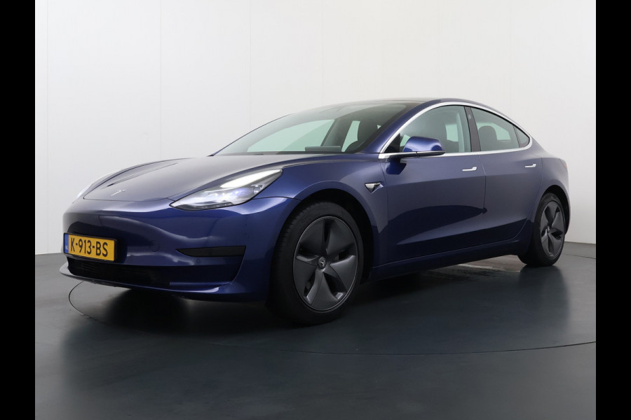 Tesla Model 3 SR Plus 325PK LFP Accu SOH 91% Lmv 18" AutoPilot Leder Pano-dak Adaptive-Cruise Camera's Elektr.-Stuur+Stoelen+Spiegels+Geheugen Navi LED ACC DAB Voorverwarmen interieur via App Keyless One-Pedal-Drive 1e Eigenaar Origineel Nederlandse Auto