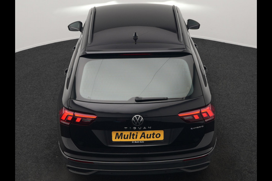 Volkswagen Tiguan 1.4 TSI eHybrid Life Plug In Hybrid 245pk Dealer O.H. PHEV | Trekhaak Af Fabriek | Adaptive Cruise | Sportstoelen & Stuur Verwarmd | Virtual | Keyless | Blis | Navigatie | DAB |