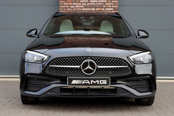 Mercedes-Benz C-Klasse Estate 300 e AMG Line | Distronic+ | Panoramadak | Memory | Stoelverwarming/-ventilatie | Verwarmd Stuurwiel | HUD | Leder | Digital Light | Surround Camera |