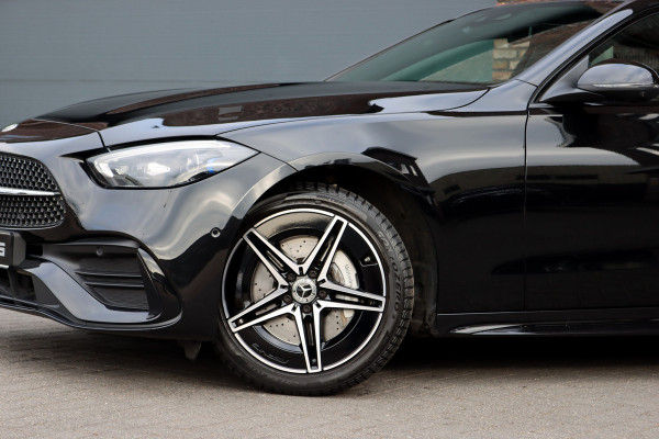 Mercedes-Benz C-Klasse Estate 300 e AMG Line | Distronic+ | Panoramadak | Memory | Stoelverwarming/-ventilatie | Verwarmd Stuurwiel | HUD | Leder | Digital Light | Surround Camera |