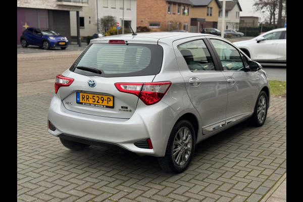 Toyota Yaris 1.5 Hybrid Executive | Lichtmetalen velgen, Half leer, Navigatie, Cruise control, Armsteun, Startknop, Safety sense
