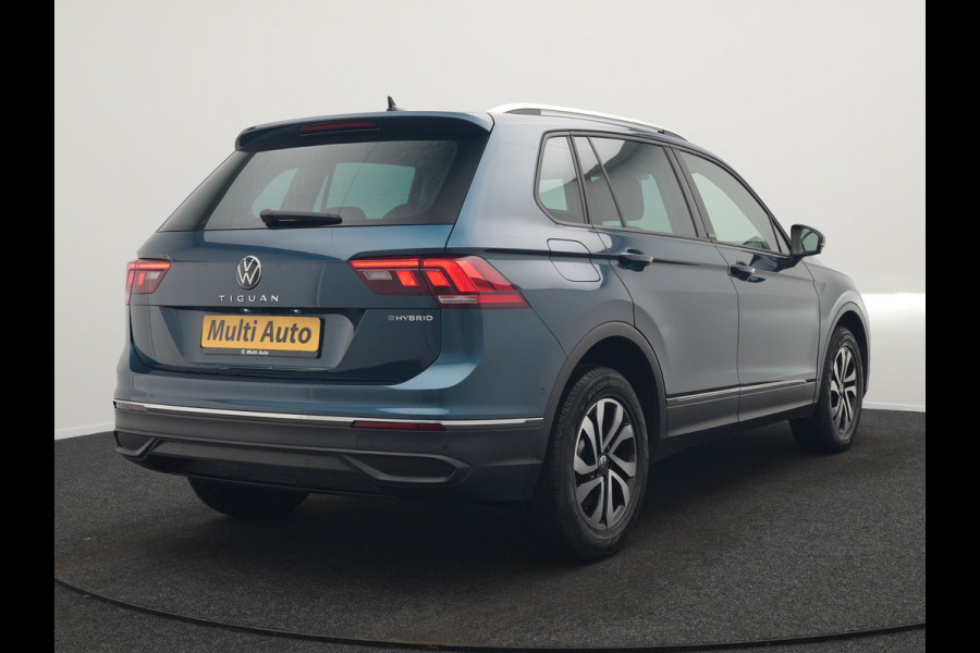 Volkswagen Tiguan 1.4 eHybrid Active Plug In Hybrid 245pk Dealer O.H. PHEV | Adaptive Cruise | 360 Camera | IQ Light | Voorstoelen & Stuur Verwarmd | Sfeerverlichting | Apple Carplay | Virtual | Keyless | Blis | Navigatie | DAB |