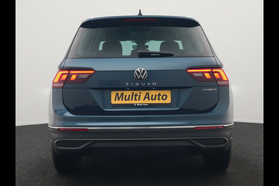 Volkswagen Tiguan 1.4 eHybrid Active Plug In Hybrid 245pk Dealer O.H. PHEV | Adaptive Cruise | 360 Camera | IQ Light | Voorstoelen & Stuur Verwarmd | Sfeerverlichting | Apple Carplay | Virtual | Keyless | Blis | Navigatie | DAB |