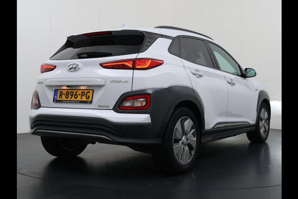 Hyundai Kona EV Premium 64 kWh SOH 100% | 3-FASE | WARMTEPOMP | LEDER | STOEL VERWARM, VENTILATIE | CAMERA | RIJKLAAR INCL. 12 MND BOVAG GARANTIE