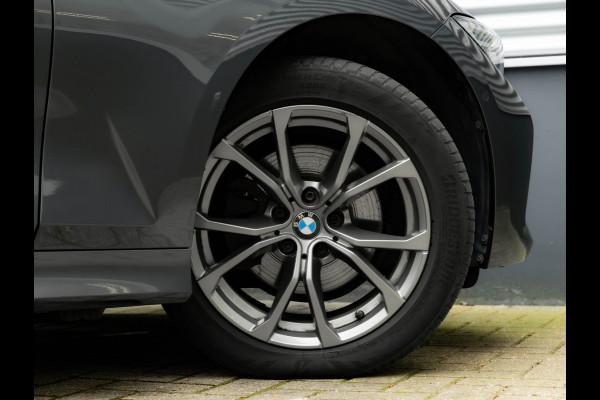 BMW 3-serie 320d - Sportstoelen - Schuif-/kanteldak - Hifi - Camera - Keyless Entry