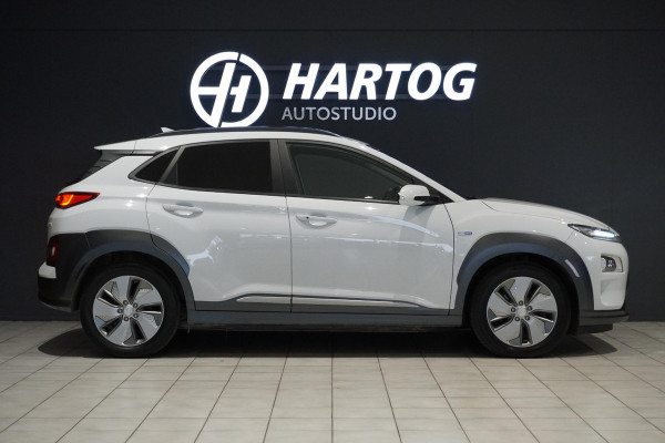 Hyundai Kona EV Premium 64 kWh + LEDER / DODEHOEK  / STUURWIEL VERWARMING