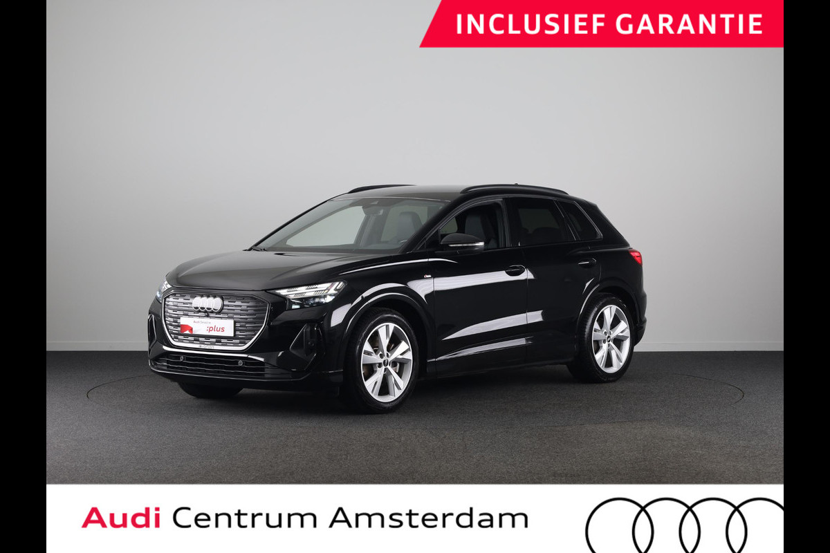 Audi Q4 e-tron 40 Launch edition S Competition 77 kWh 204 pk | SoH 95% | Navigatie | Warmtepomp | Parkeersensoren | Achteruitrijcamera | Stoelverwarming | S-Line |