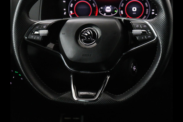 Škoda Karoq 1.5 TSI Sportline | Panoramadak | Trekhaak | Stoelverwarming | Camera | Carplay | Virtual Cockpit | Canton Sound | 19'' | Parkeerhulp | Navigatie | Sfeerverlichting | Cruise control | Stuurverwarming