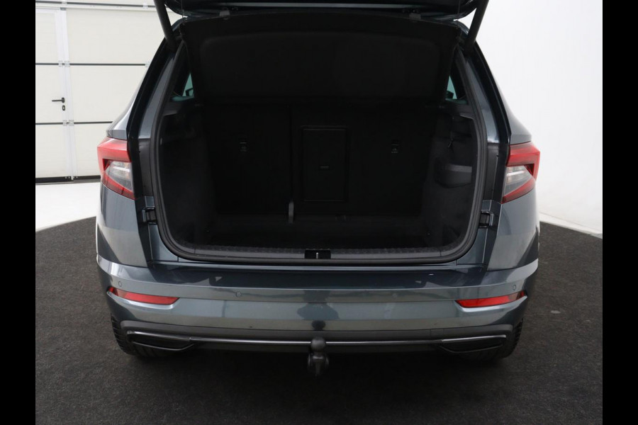 Škoda Karoq 1.5 TSI Sportline | Panoramadak | Trekhaak | Stoelverwarming | Camera | Carplay | Virtual Cockpit | Canton Sound | 19'' | Parkeerhulp | Navigatie | Sfeerverlichting | Cruise control | Stuurverwarming