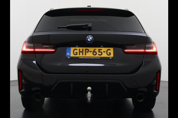 BMW 3 Serie Touring 320e VAN € 42.899,- VOOR € 39.877,- UW LENTEVOORDEEL: €3.022,-! | M-SPORT | FACELIFT| PANO|1.STE EIGENAAR, DEALER OH. | LEER | ELEK. TREKHAAK| FABRIEKSGARANTIE T/M 08 2027| LEER| STOELVERWARMING| 19 INCH! SUPER COMPLEET!