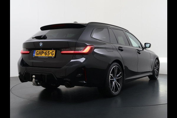 BMW 3 Serie Touring 320e VAN € 42.899,- VOOR € 39.877,- UW LENTEVOORDEEL: €3.022,-! | M-SPORT | FACELIFT| PANO|1.STE EIGENAAR, DEALER OH. | LEER | ELEK. TREKHAAK| FABRIEKSGARANTIE T/M 08 2027| LEER| STOELVERWARMING| 19 INCH! SUPER COMPLEET!