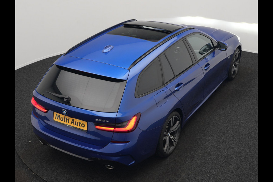 BMW 3 Serie Touring 330e M Sport PHEV 293pk Dealer O.H. | Panodak | Head Up | Laser LED | Adaptief Onderstel | Camera | Alcantara Sportstoelen Memory & Verwarmd | Sfeerverlichting | Apple Carplay | Keyless | Blis | 19"L.M | Virtual | DAB | Plug In